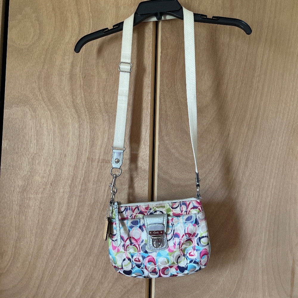 Coach crossbody with a snap front pocket